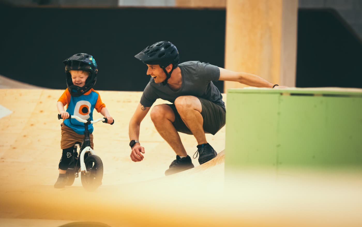 Child with adult at North Shore Bike Park