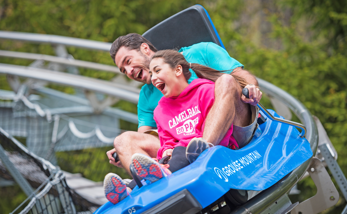 Father and child on Grouse Mountain Coaster