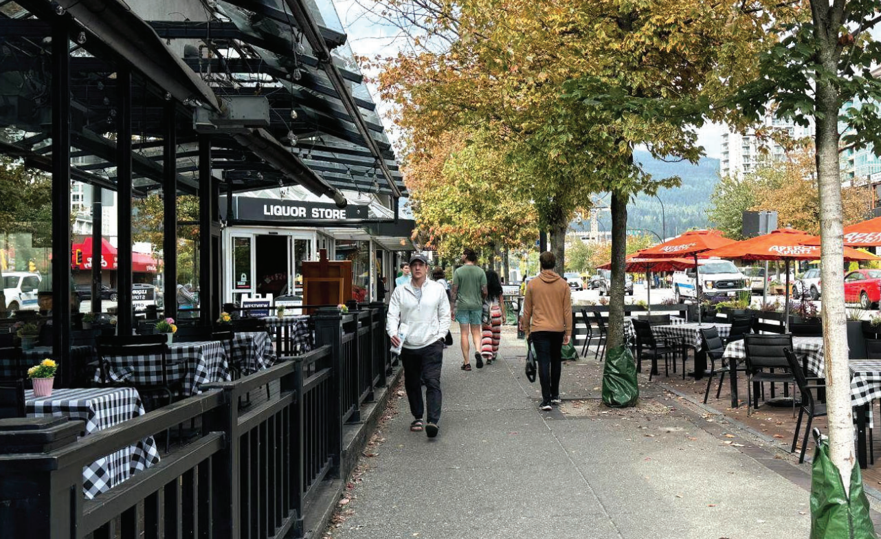 People walking on Central Lonsdale.