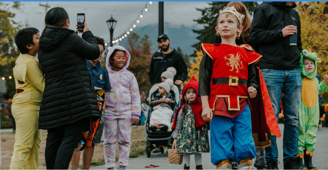 Children in Halloween costumes at an outdoor event