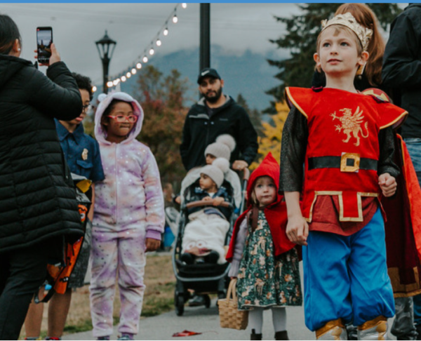 Children in Halloween costumes at an outdoor event